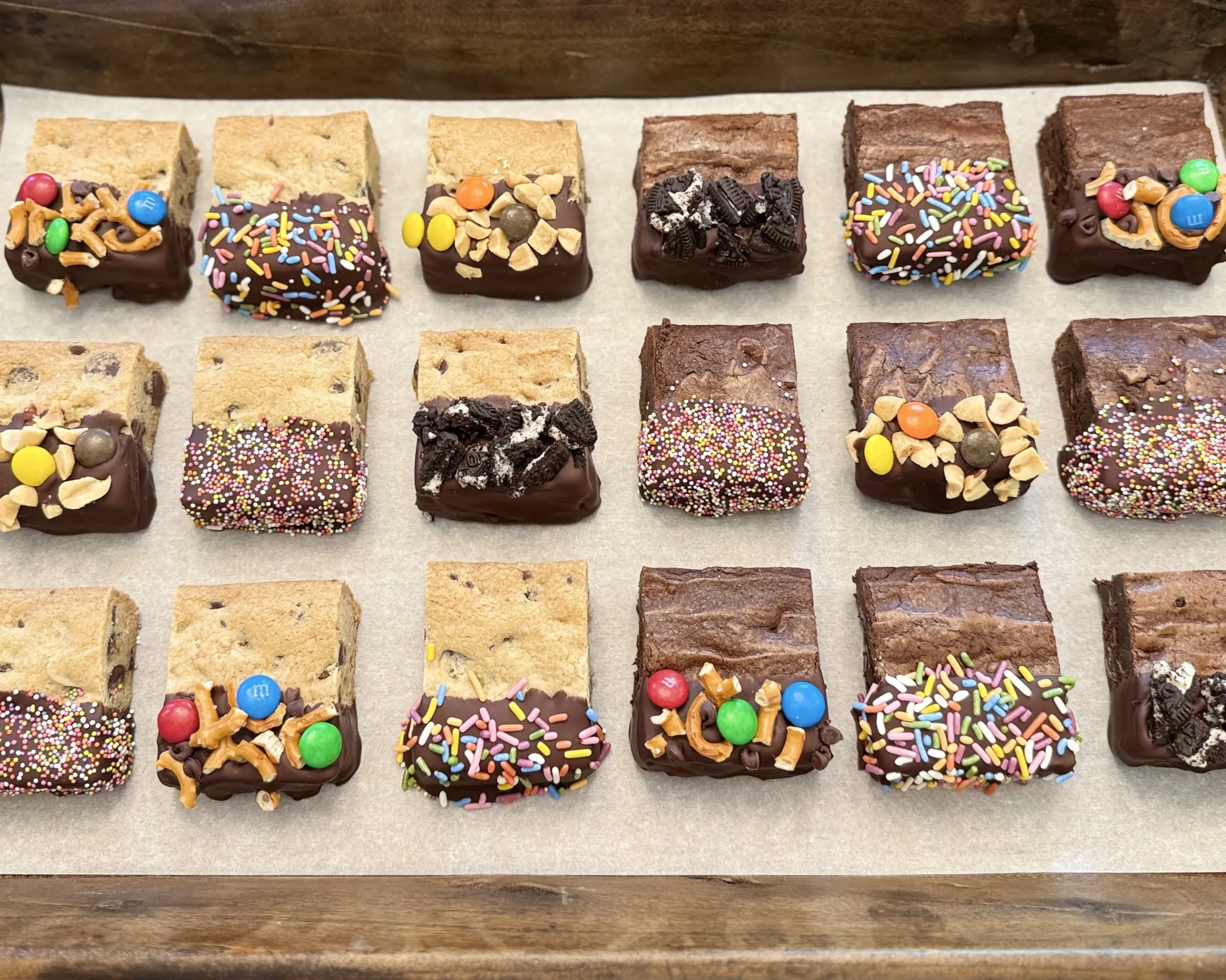 Thick and Chewy Chocolate Chip Cookie Bars Dipped in Chocolate